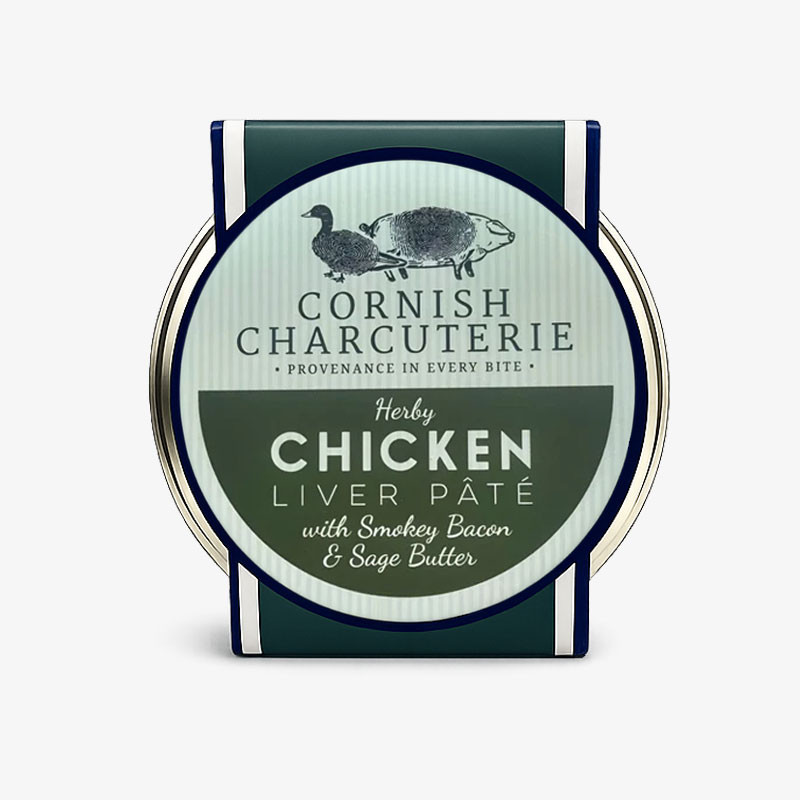 Cornish Charcuterie Herby Chicken Liver Pâté in a green and cream round tin with navy trim.