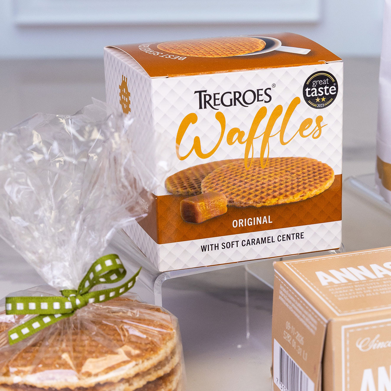 Tregroes Original waffles with soft caramel centre displayed alongside individually wrapped caramel waffles.