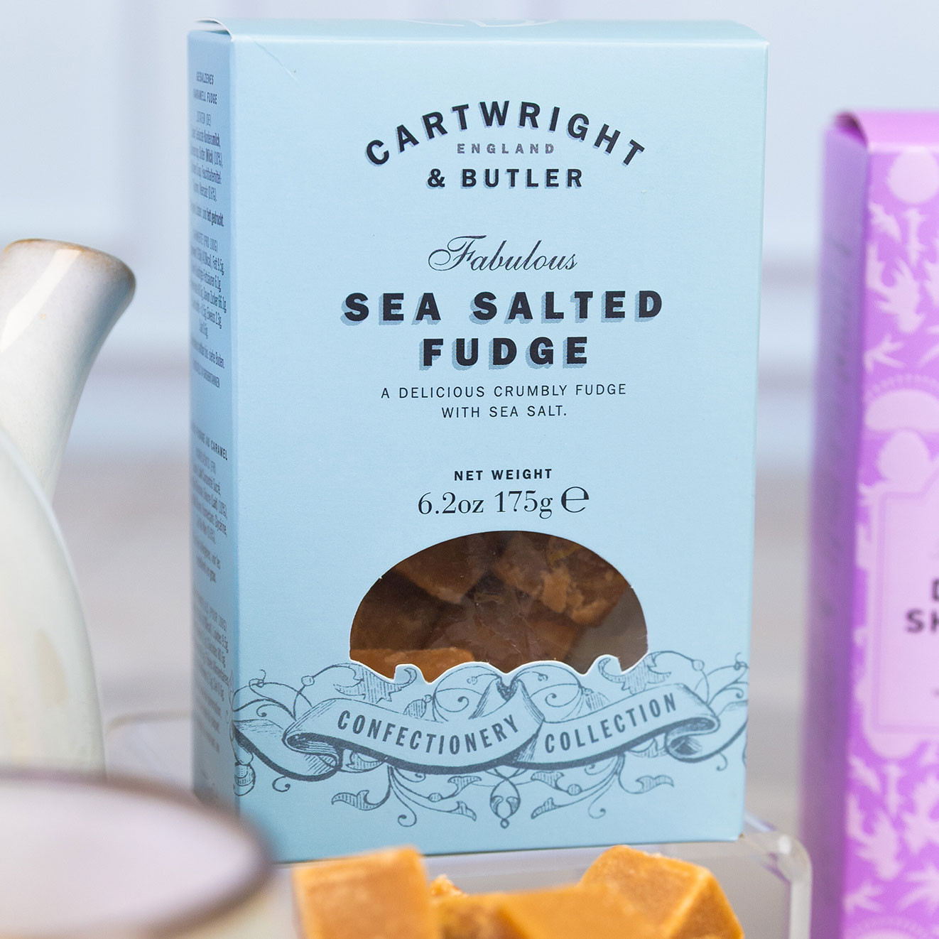 Cartwright & Butler Sea Salted Fudge displayed with pieces of crumbly sea salted fudge.