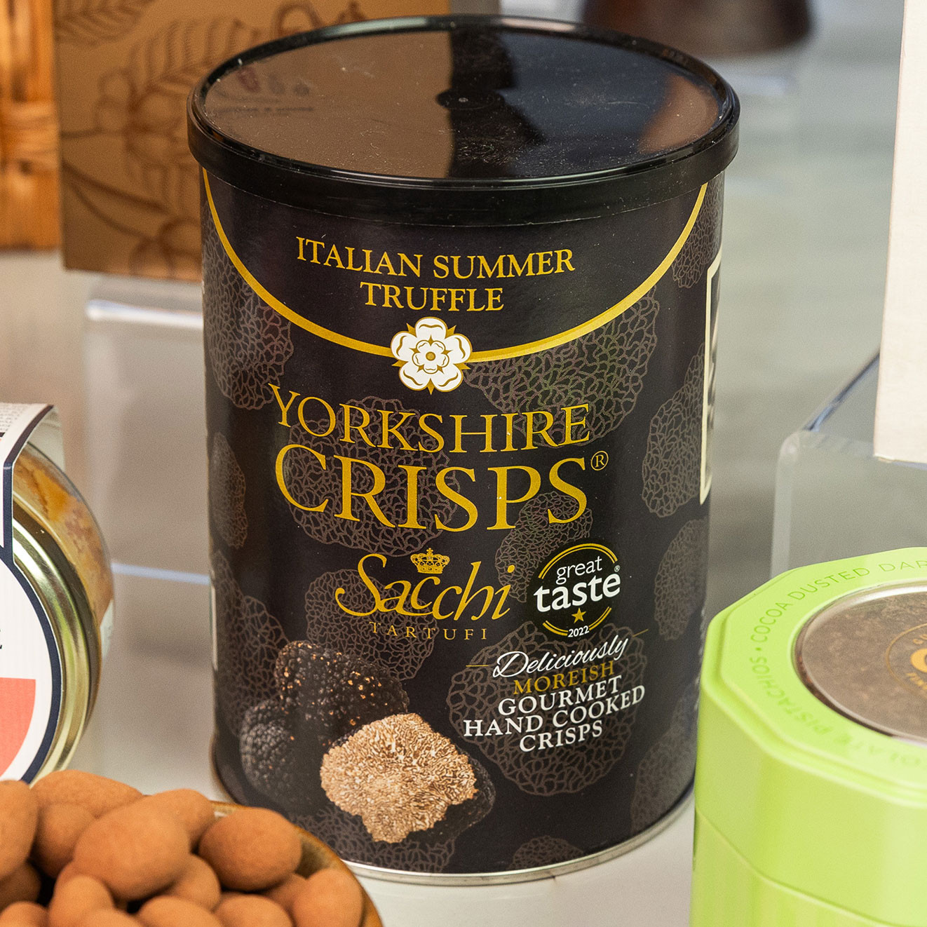 Yorkshire Crisps Italian Summer Truffle gourmet hand cooked crisps in a premium black sharing tin.