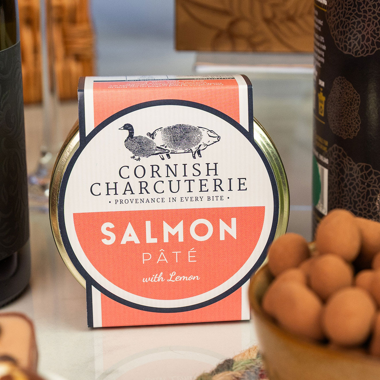 Cornish Charcuterie Salmon Pâté with lemon, presented in a ready-to-serve gourmet tin.