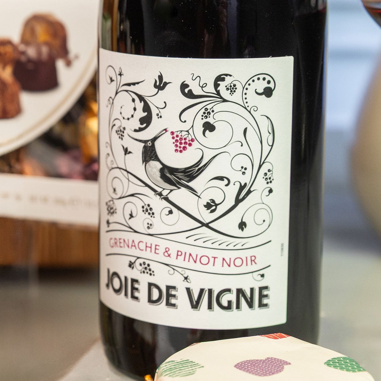 Bottle of Joie de Vigne Grenache & Pinot Noir, a smooth red wine included in this premium gourmet hamper.
