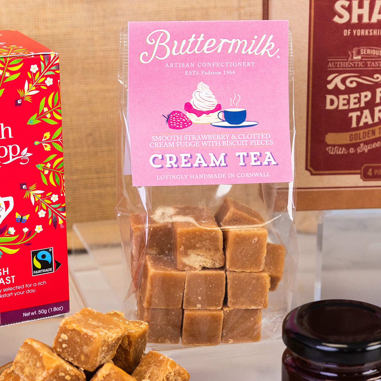 Buttermilk Cream Tea fudge with strawberry and clotted cream flavour, presented in a gift bag with individually cut fudge pieces.