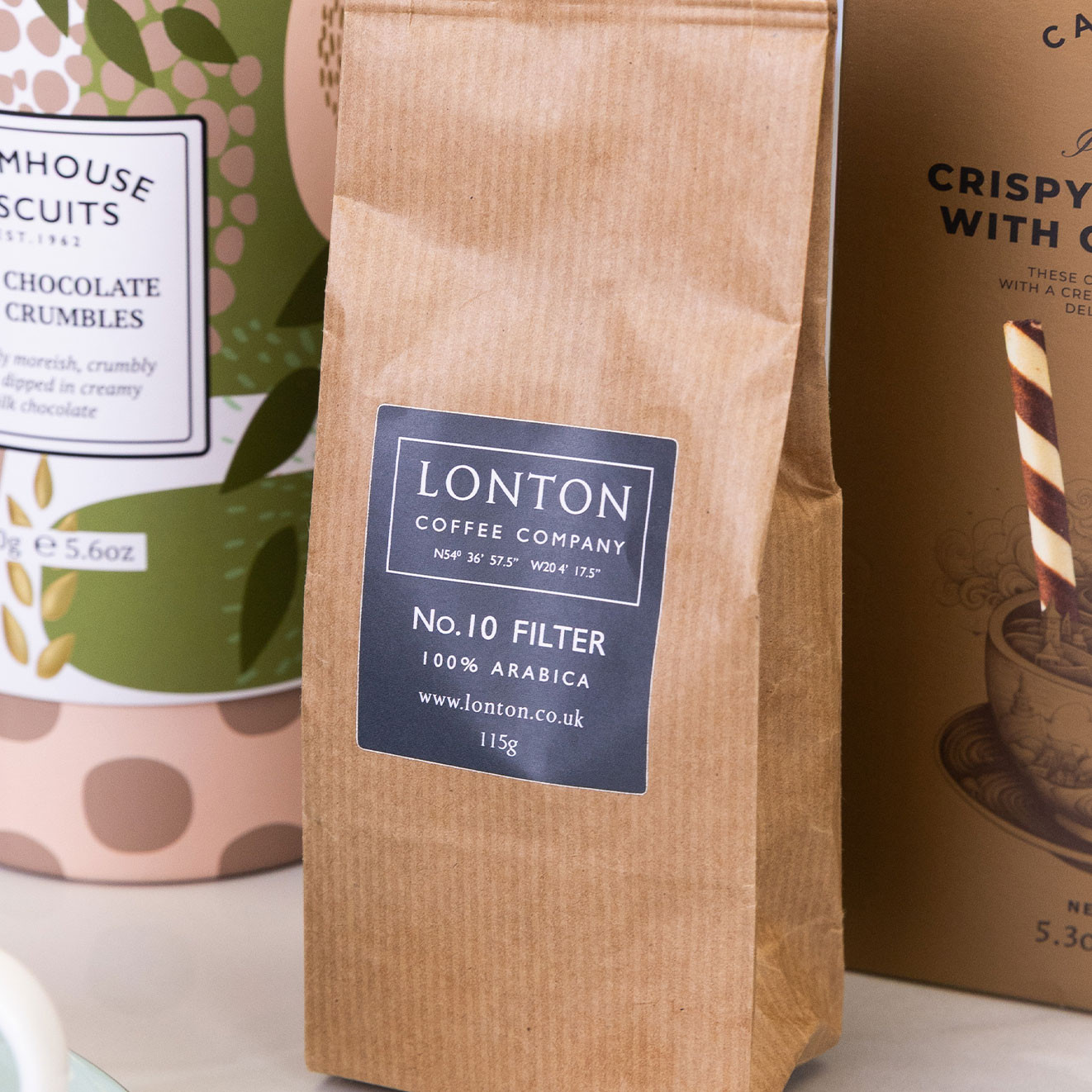Lonton Coffee Company No.10 Filter 100% Arabica ground coffee presented in a kraft paper bag.