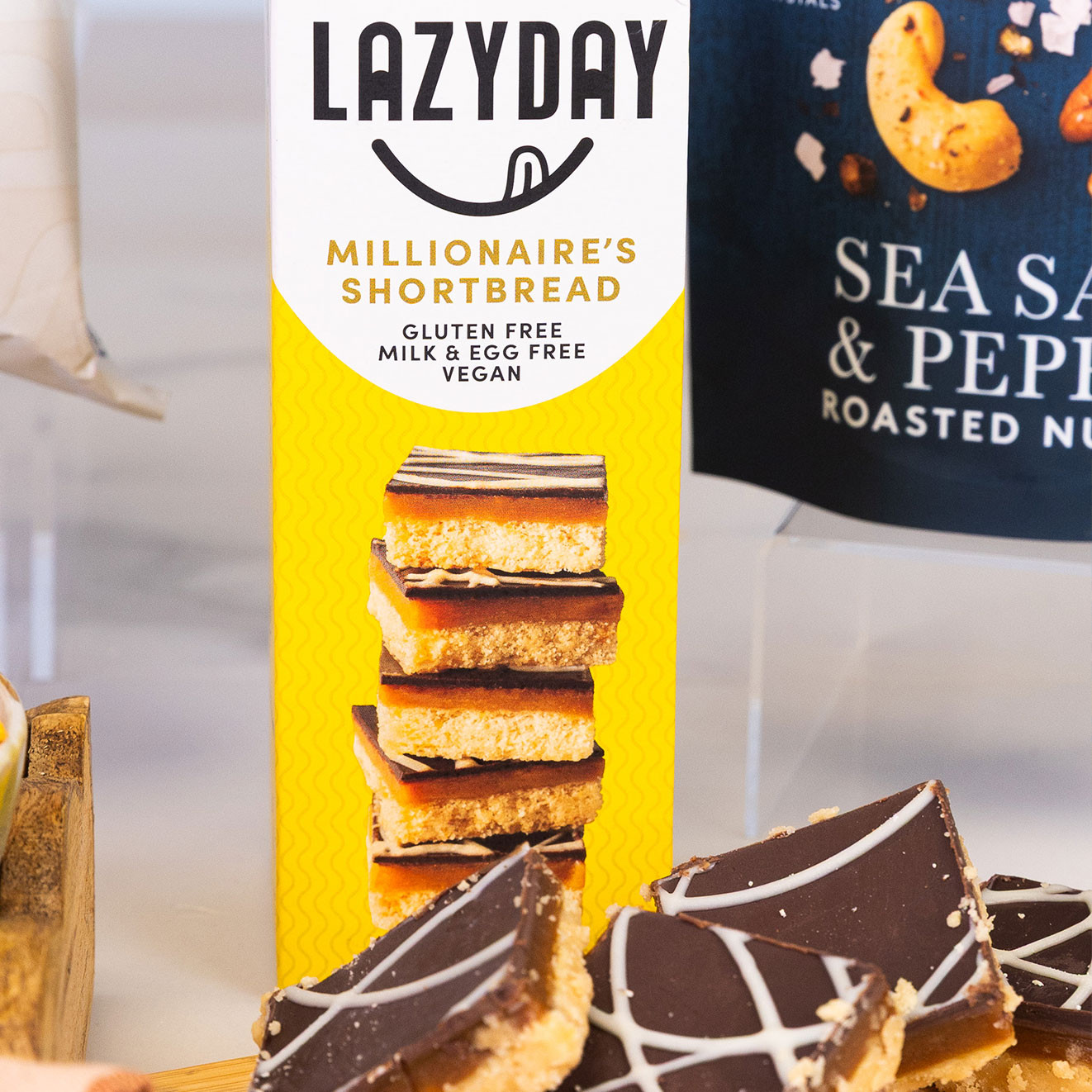 Lazy Day vegan, gluten-free Millionaire's Shortbread with rich caramel and chocolate layers, served in bite-sized slices.