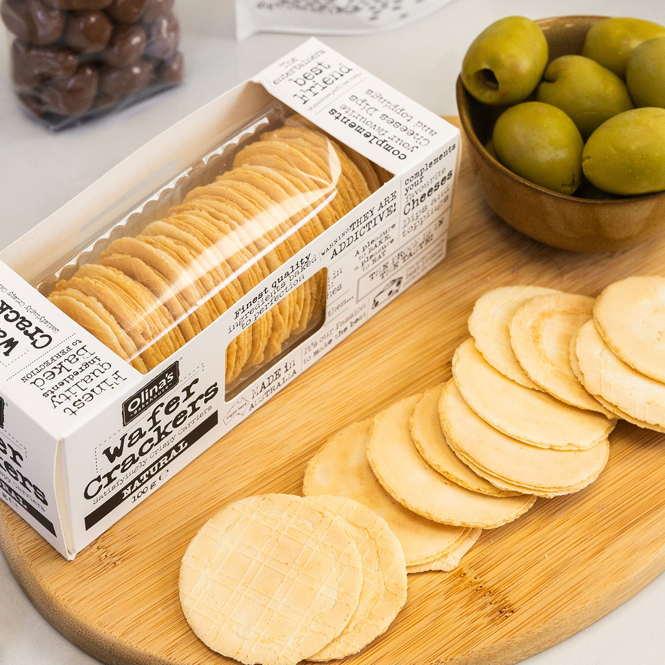 Olina's Bakehouse Natural Wafer Crackers, light and crispy crackers ideal for pairing with cheese, olives and antipasti.
