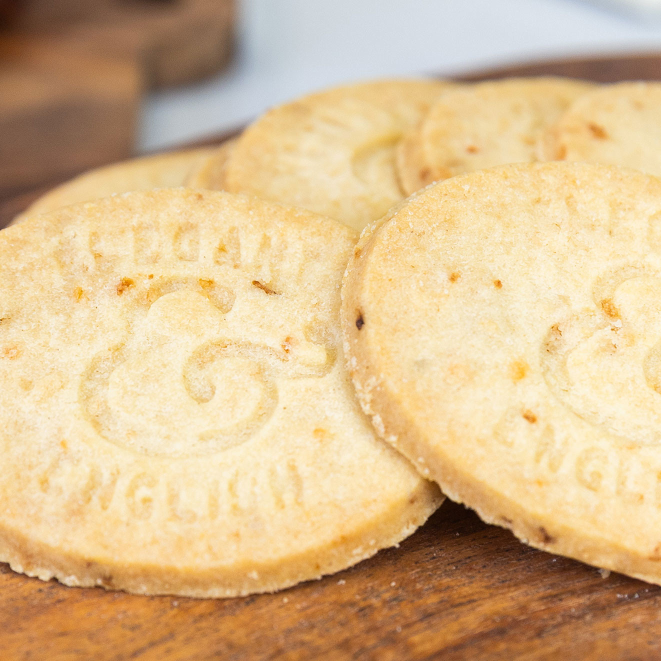 Close-up of buttery apple and custard biscuits with a crisp golden finish, perfect for an afternoon tea treat.