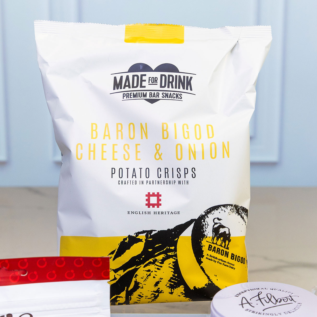 Made for Drink Baron Bigod Cheese & Onion potato crisps, crafted with British artisan cheese for a premium savoury snack.