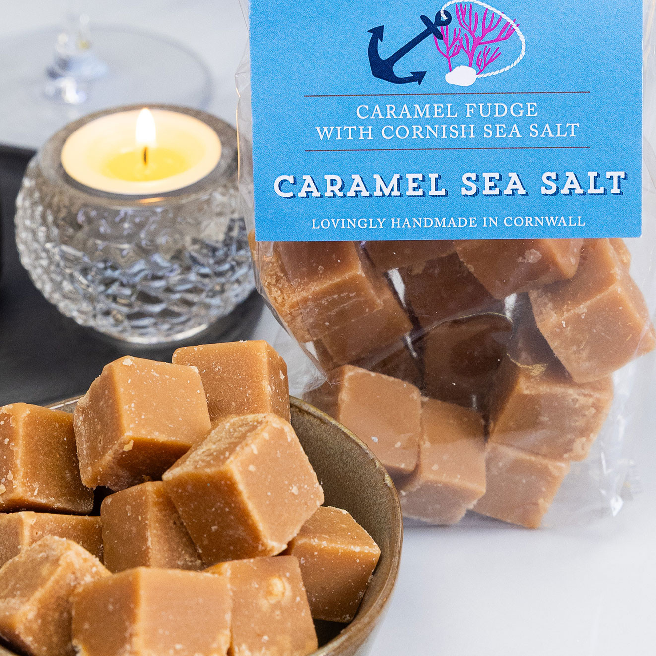 Buttermilk Caramel Sea Salt handmade fudge from Cornwall, presented in a gift bag with chunky fudge pieces ready to enjoy.