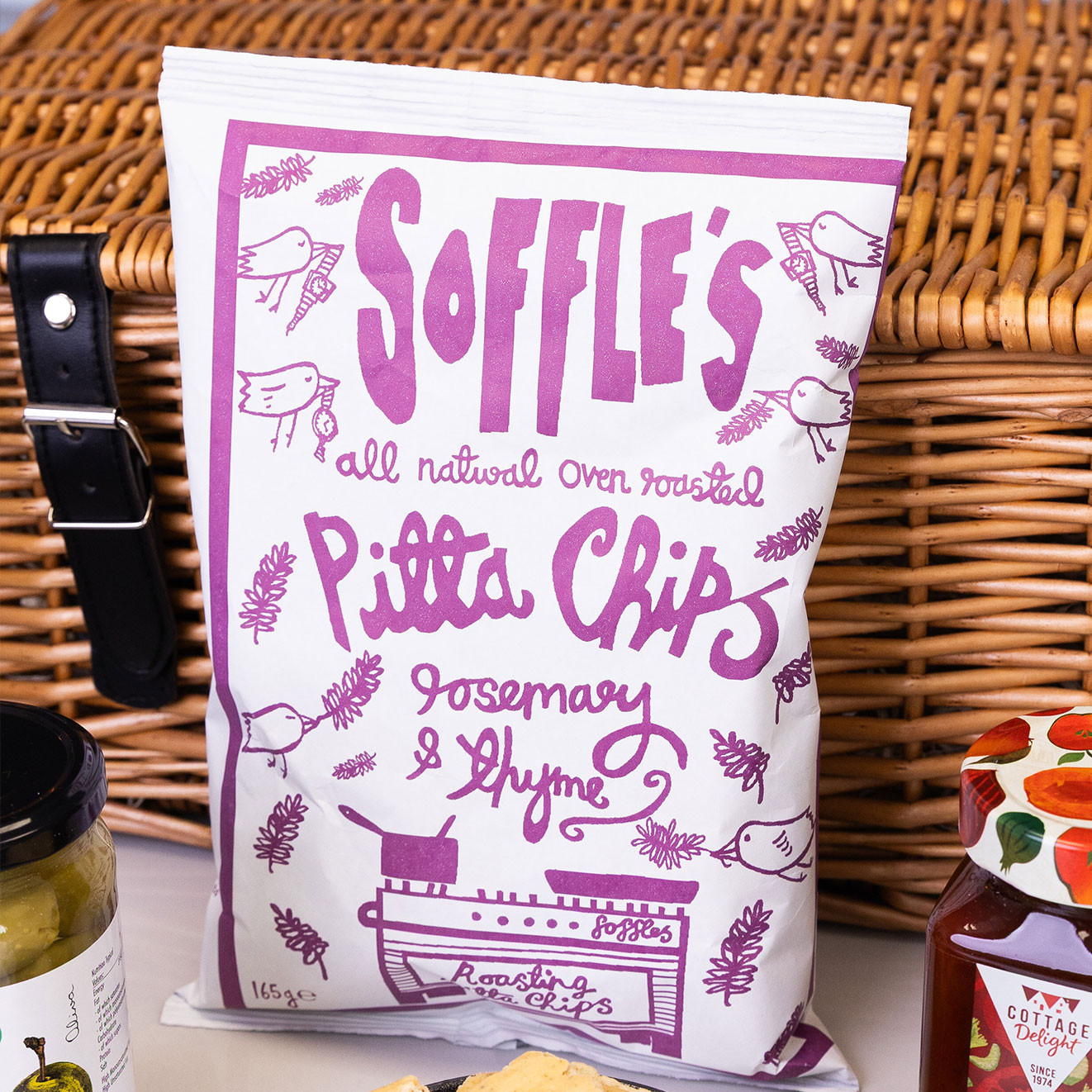Softie's all-natural rosemary and thyme pita chips in a sharing bag, perfect for dipping and entertaining.
