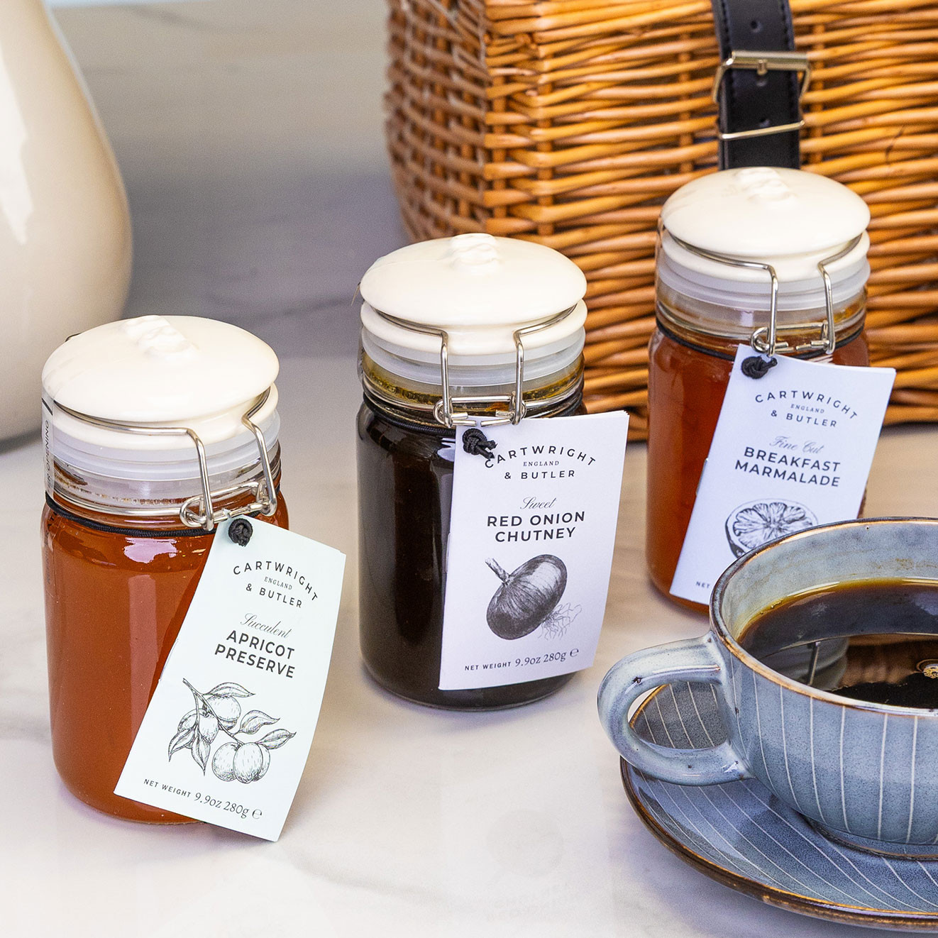 Selection of Cartwright & Butler preserves including apricot preserve, breakfast marmalade and sweet red onion chutney, perfect for breakfast and cheeseboards.