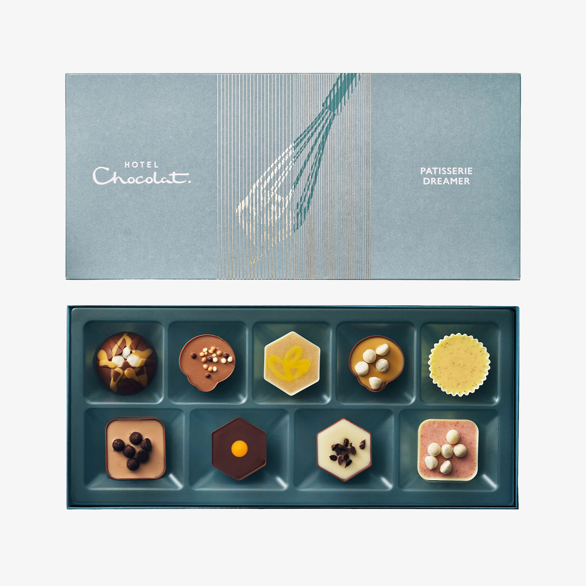 Hotel Chocolat Patisserie Dreamer collection, with a blue presentation box and an open tray of nine assorted dessert-inspired chocolates.