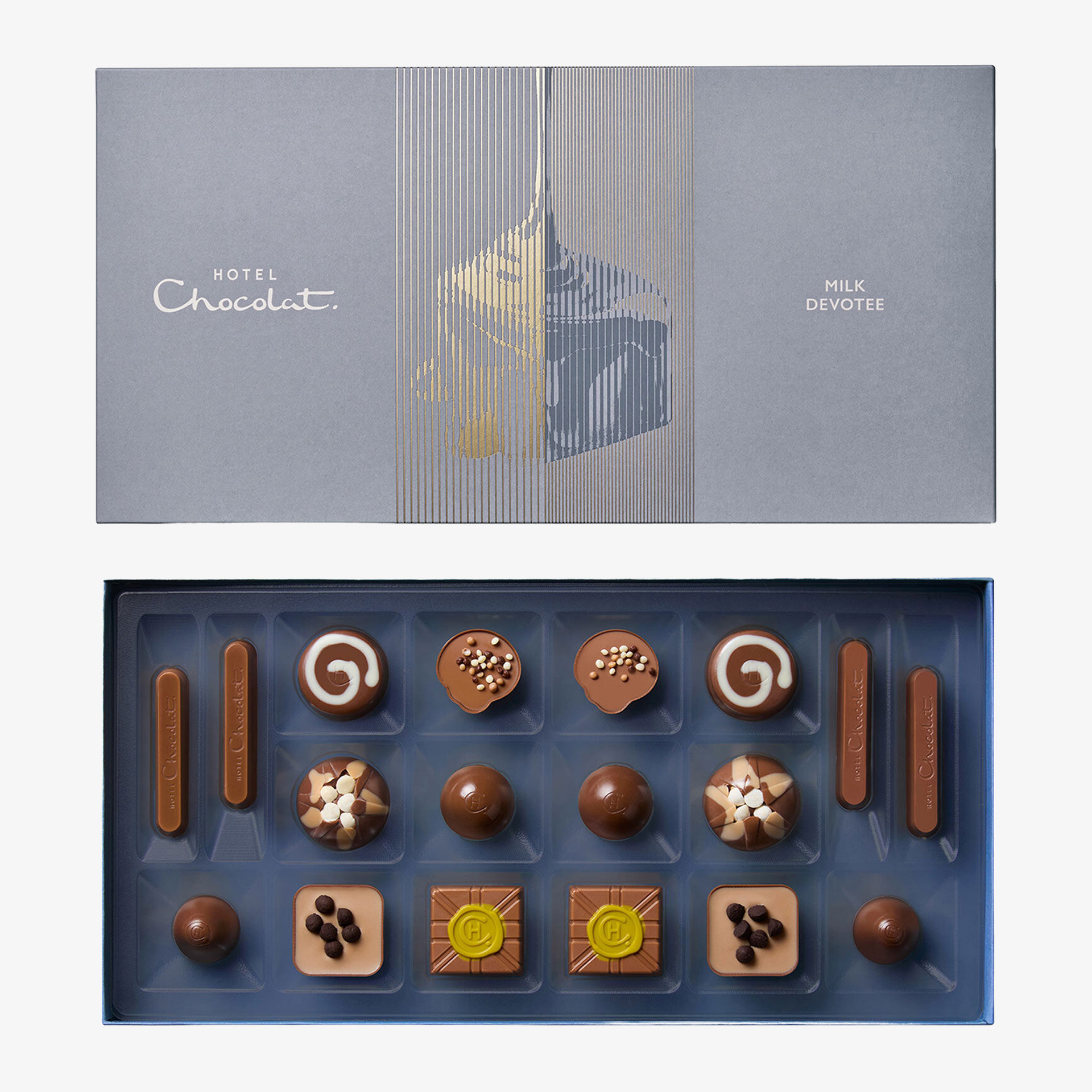 Hotel Chocolat Milk Devotee chocolate selection box containing an assortment of decorated milk chocolates and pralines.