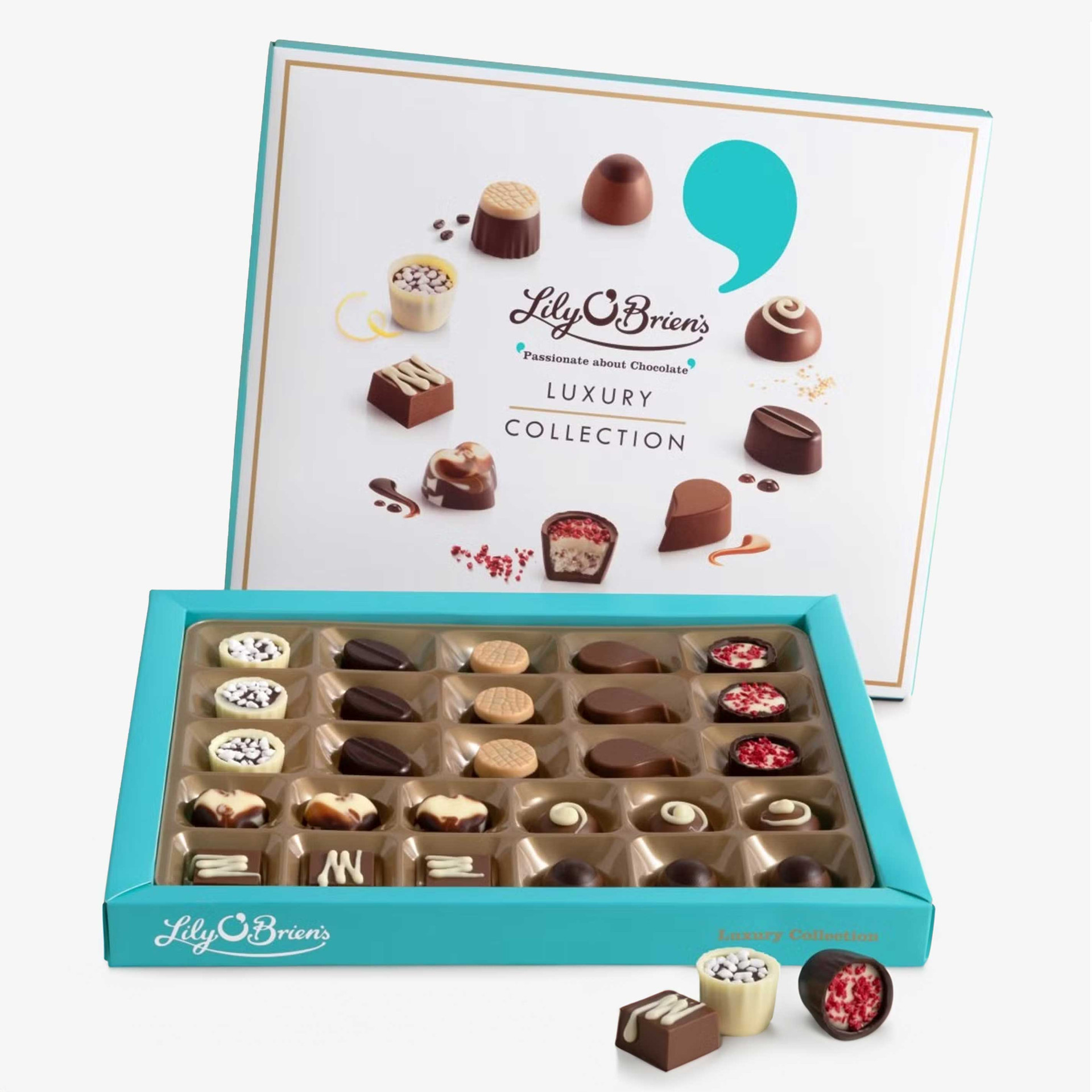 Lily O’Brien’s Luxury Collection, shown with a white and turquoise presentation box and an open tray of assorted milk, dark and white chocolates, with three chocolates displayed in front.