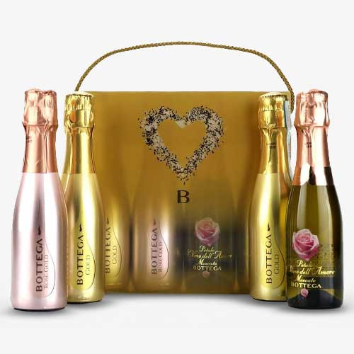 Bottega sparkling wine gift set featuring four miniature bottles of Gold, Rosé Gold and Petalo Moscato, presented with a gold gift box