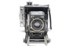 Pre-Owned - GRAFLEX SPEED GRAPHIC 2 X 3 Camera w/ Carl Zeiss Jena Tessar 11.5cm (115mm) F/4.5 w/Speedgun, Flash Tube, Film Holders, & Leather Carrying Case