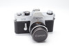 Canon TX Film Camera w/ 50mm Canon FL f/1.8 lens (Silver)