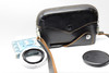 Pre-Owned - Canon lens cap and  Leather case for Canon Cannonet