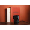 Sigma - 35mm f/1.4 DG II ART Lens for Leica L Mount with background