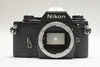 Pre-Owned Nikon EM Film Camera w/RMC Tokina 35-105mm f/3.5-4.3 N/AI Lens