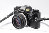 Pre-Owned - Olympus OM-10 Black w/Olympus MC auto-s 50mm F/1.8