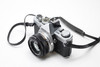 Pre-Owned - Olympus OM-1N (SILVER) w/ 50mm f1.8 & shoe 4 film camera