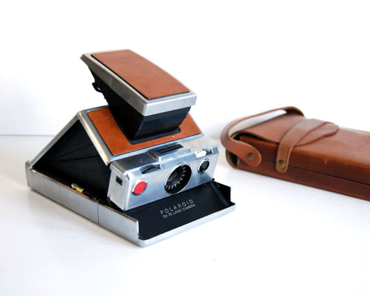 Pre-Owned Polaroid SX-70 silver and Brown leather camera at