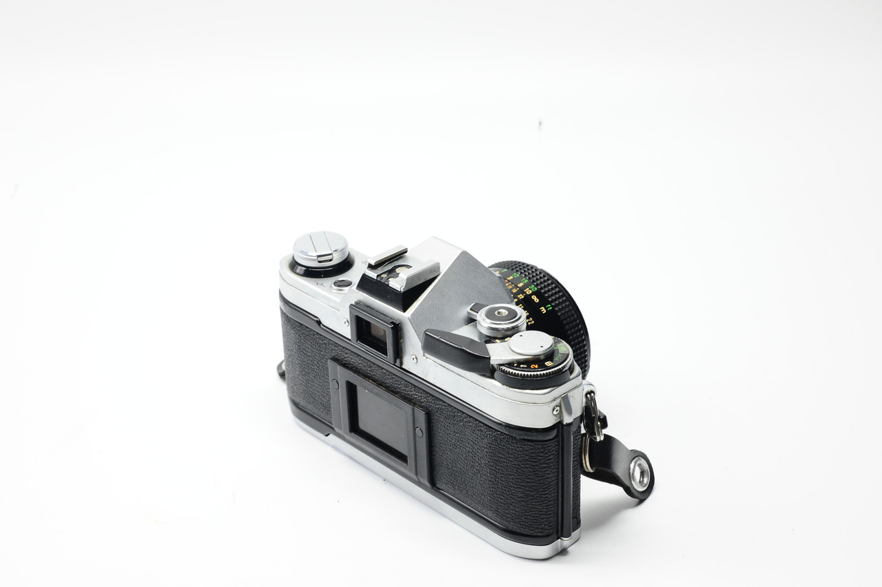 Pre-Owned - Canon AE-1 Chrome w/50mm f1.8 FD/SC lens at Acephoto.net