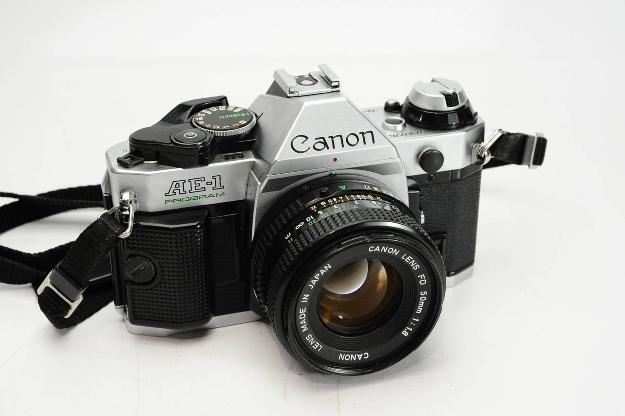 Pre-Owned - Canon AE-1 Program Silver w/ 50mm 1.8 FD/SC Lens at Acephoto.net