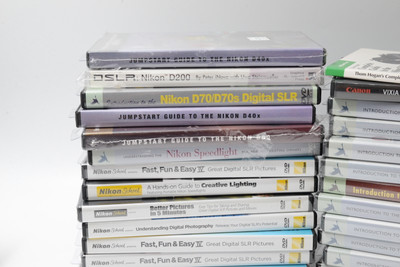 Nikon/Canon DVD Bundle I. 32 new and sealed Nikon and Canon DVD's