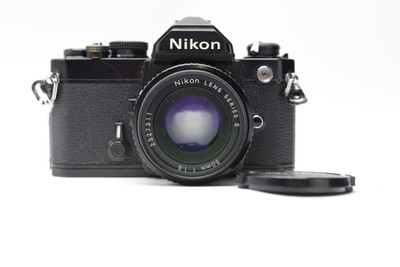 Pre-Owned Nikon FM Black w/50mm F/1.8E , AIS lens, 200-DAY WARRANTY.