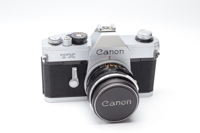 Canon TX Film Camera w/ 50mm Canon FL f/1.8 lens (Silver)