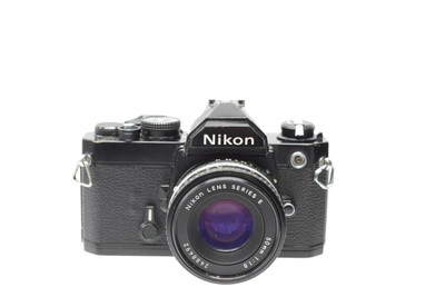 Pre-Owned Nikon FM Black w/50mm F/1.8E , AIS lens, 200-DAY WARRANTY.