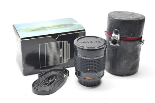 Pre-Owned - Minolta RF 250MM F5.6   Manual focus len in the box like news mirror reflex.
