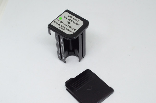 Pre-Owned Original Canon battery holder and battery dooe for 199A Flash