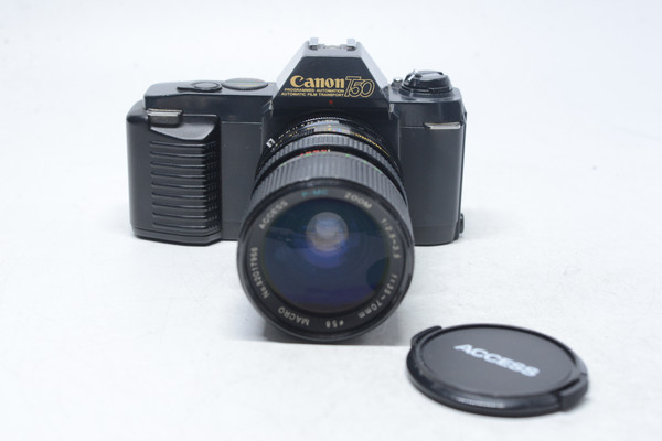 Pre-Owned - Canon T50 film camera w/35-70mm f2 5-3.5 FD LENS ACCESS
