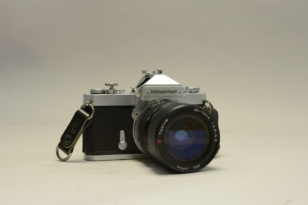 Pre-Owned - Nikkormat FTN silver body w/ Tokina 28-70mm f/2.8-4.3