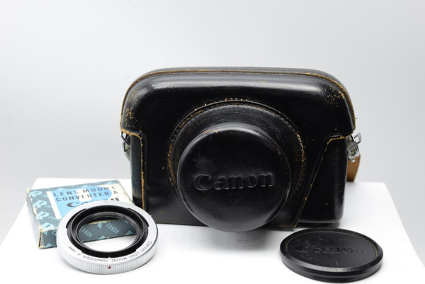 Pre-Owned - Canon lens cap and Leather case for Canon Cannonet