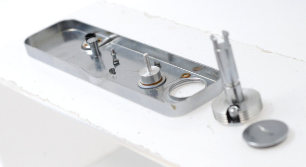 Pre-Owned - Kowa baseplate (with screws), rewind knob and battery door.