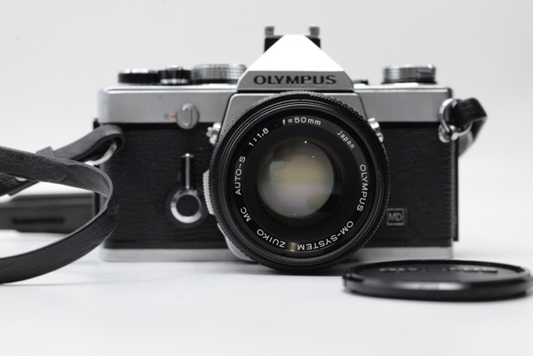 Pre-Owned - Olympus OM-1N (SILVER) w/ 50mm f1.8 & shoe 4 film camera