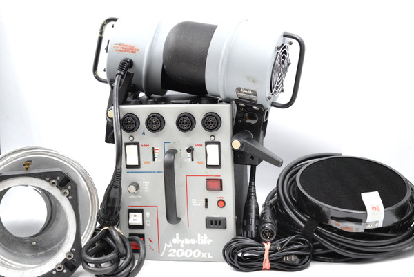 Pre-Owned - Dyna-Lite M2000X Power Pack, (2) Dyna-Lite 4040 lights, (3) Powercords, 2 shades and accessories