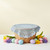 White Easter Basket Cover, Lace Cutouts covering a easter basket
