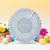 White Easter Basket Cover, Lace Cutouts. surronded by spring flowers