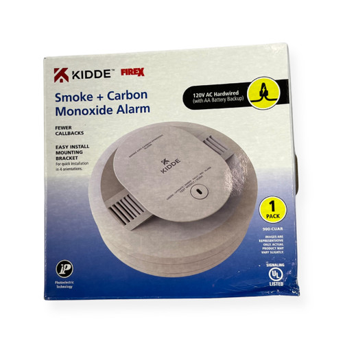 The 900-CUAR Hardwired Smoke & Carbon Monoxide Detector, which can be interconnected and comes with AA battery backup, safeguards you and your loved ones from two potential dangers: fires and the harmful presence of carbon monoxide (CO). This combination smoke and carbon monoxide detector boasts self-testing components that continuously verify the alarm's functionality. It utilizes a photoelectric smoke sensor for improved detection of larger, visible fire particles.