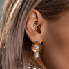SoScene Crescent Hinged Segment Hoop Rings, jewelry on ear with gold-colored crescent hinged segment hoop ring and pearl drop earring.