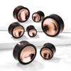 SoScene Organic Sono Wood Saddle Plug with Concave Copper Center, product image showing multiple decorative gauges with wooden exterior and polished copper interior design.