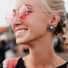 SoScene Pink Opalite Stone Centered Tear Drop Filigree Front 316L Surgical Steel Double Flared Tunnels, close-up of woman wearing pink opalite stone earrings and sunglasses.