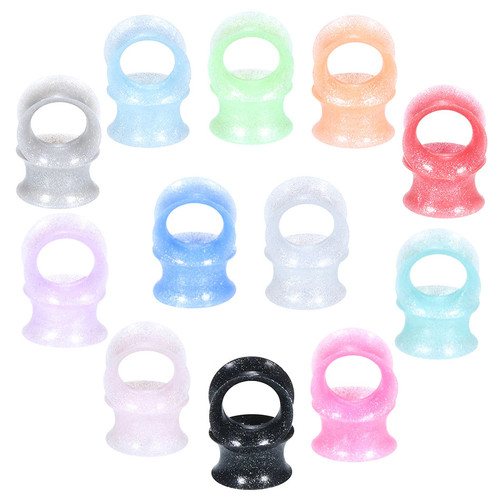 SoScene Glitter bomb soft silicone ultra thin ear gauge skins, colorful and sparkling ear gauges in various pastel and vibrant colors with glitter finish.