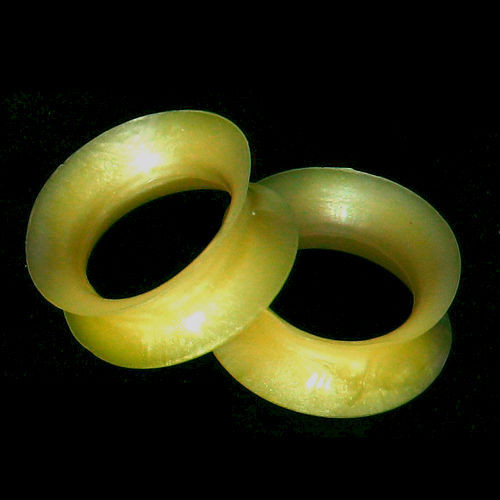 SoScene Pearlescent Yellow Ultra Thin Ultra Low Profile Silicone Ear Skins, close-up view of lightweight, glossy yellow silicone ear skins for a comfortable fit.