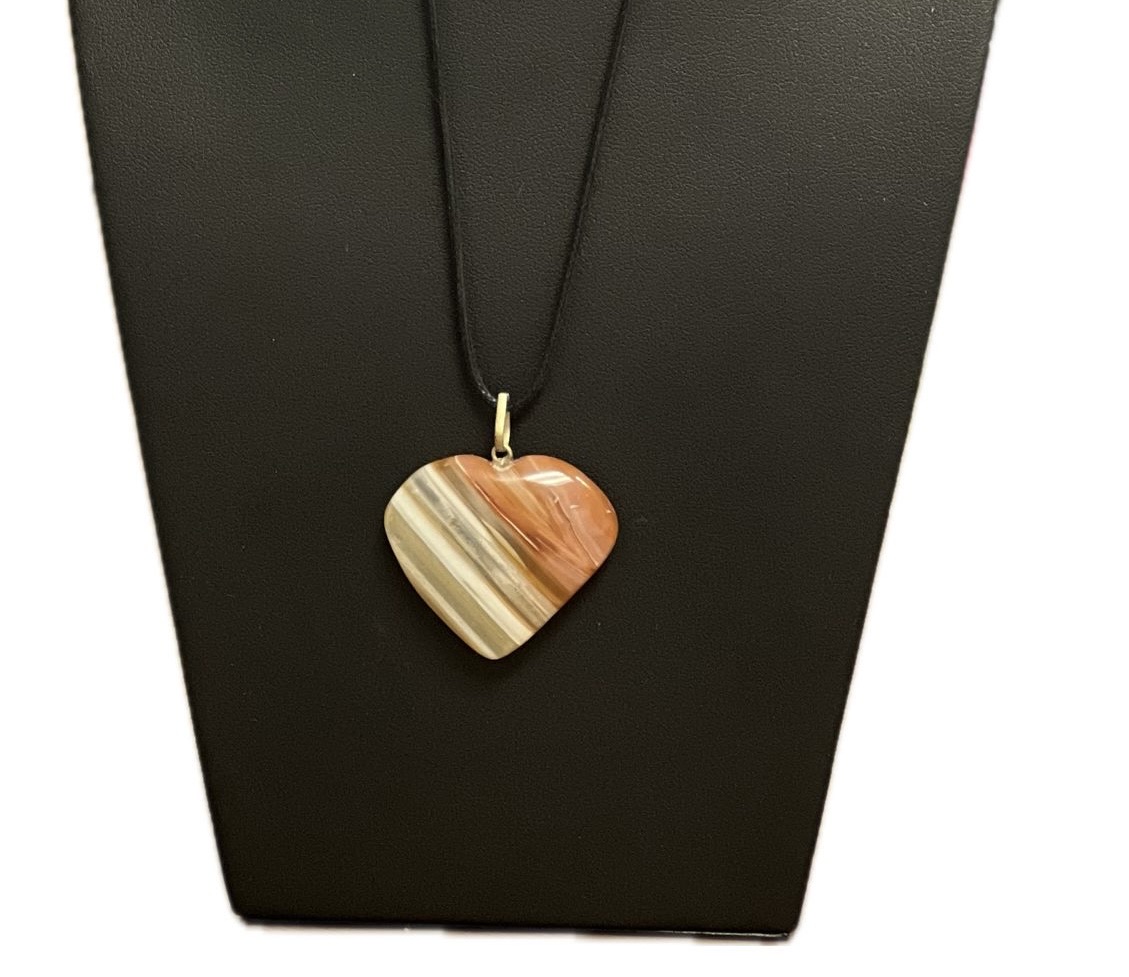 Heart shaped pendants Red Onyx 1" approx New Arrivals VD Importers Inc.